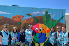 RR with Wally in front of the mural