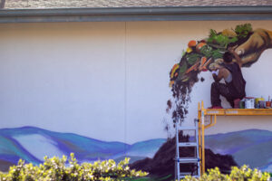 Hanif painting mural