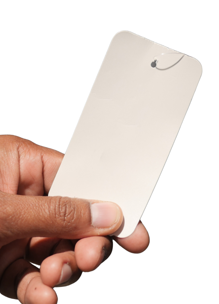 Holding a clothing price tag